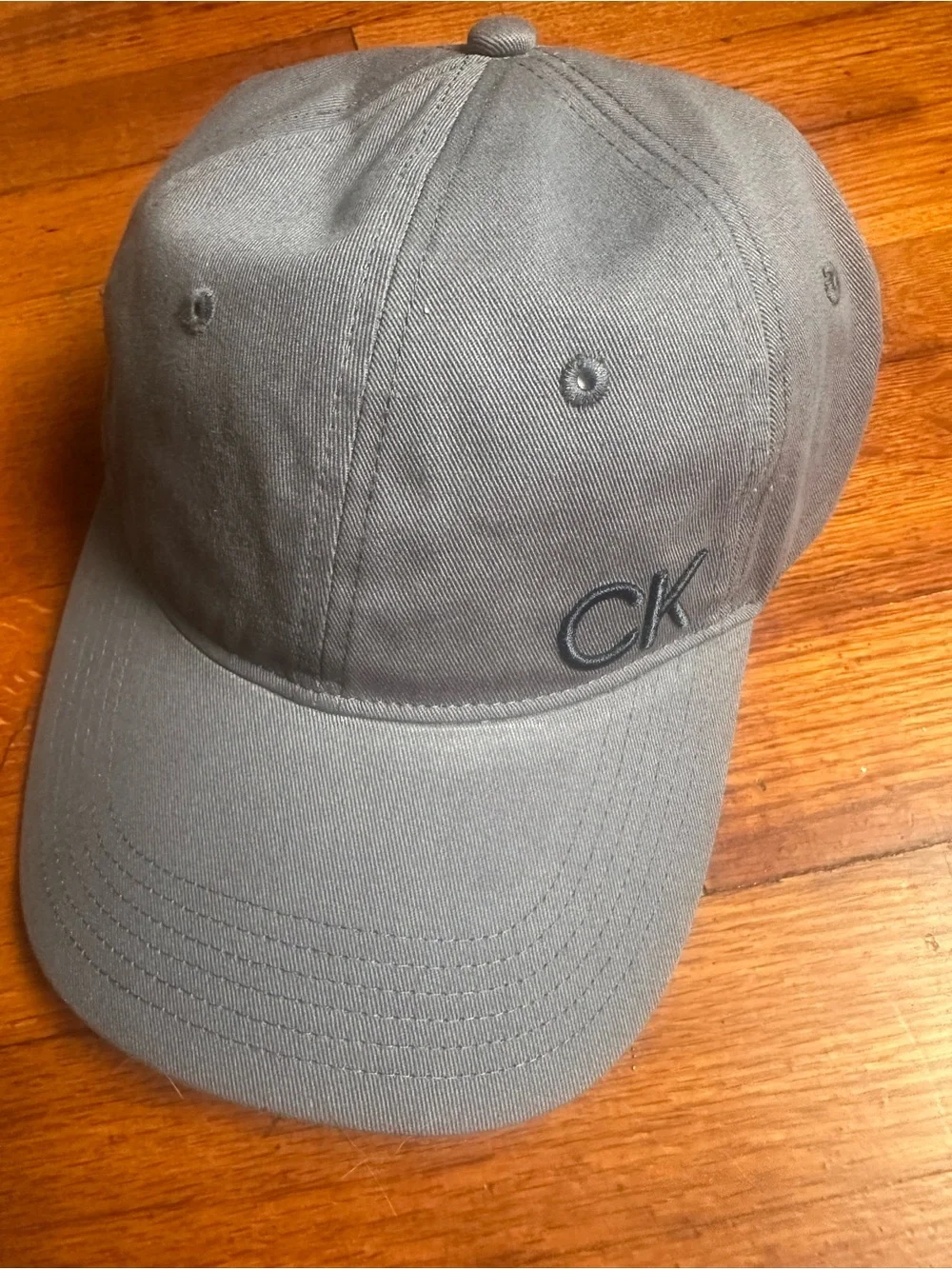 Calvin Klein women baseball cap grey With Blue accents inside logo